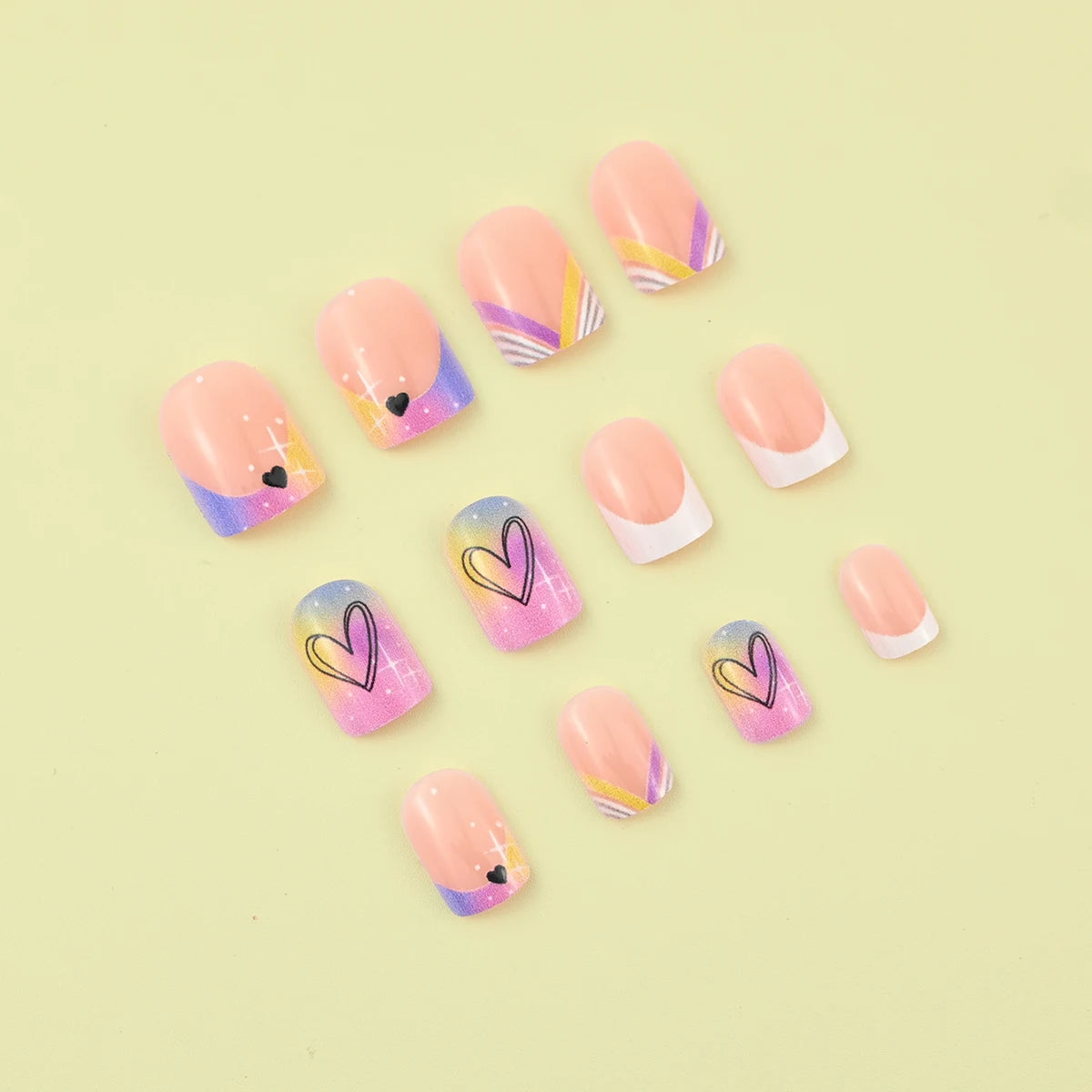 24 pieces of short square fake nails, featuring a halo dyed gradient heart and a colorful French design in European and American