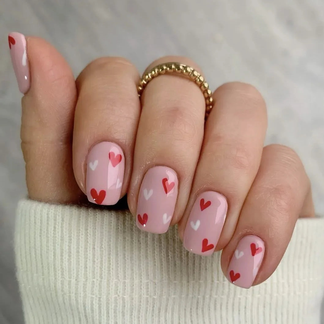 24 pieces of short square fake nails, featuring a halo dyed gradient heart and a colorful French design in European and American