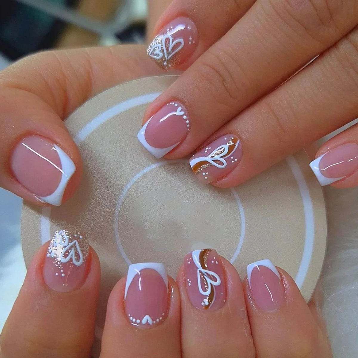 24 pieces of short square fake nails, featuring a halo dyed gradient heart and a colorful French design in European and American