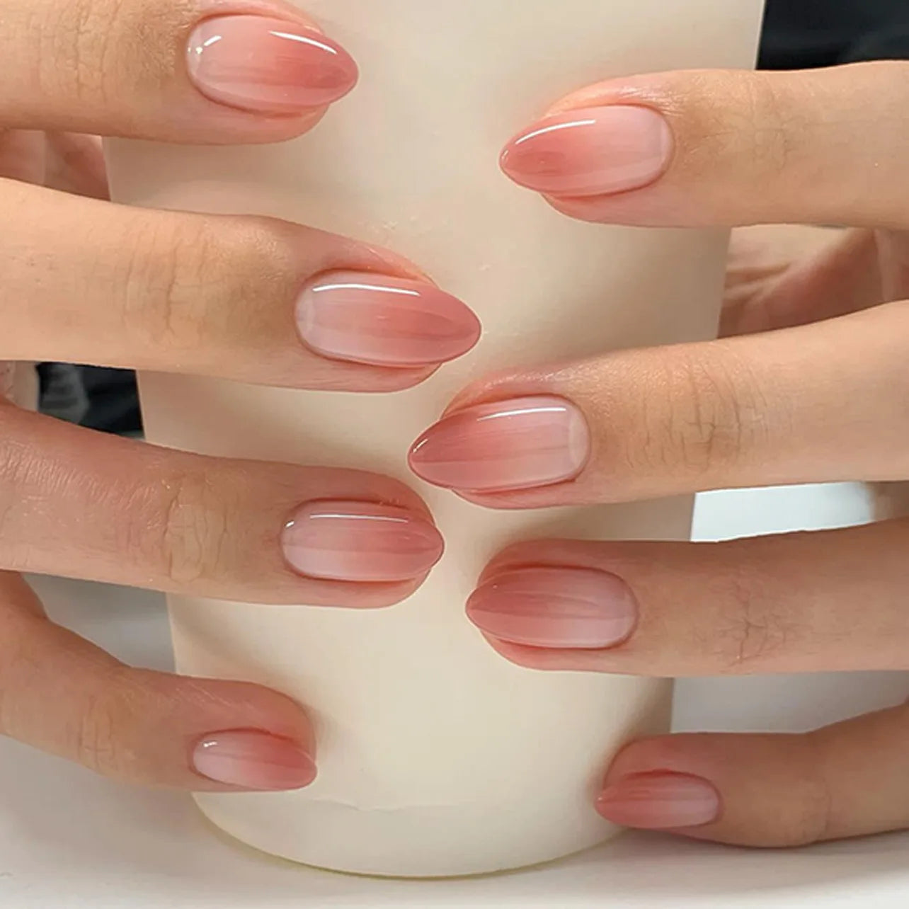 24Pcs Short Oval Head Blush Pink Press on Nails with Simple Designs Almond Nails Wearable Acrylic Full Cover Nail Tips with Glue