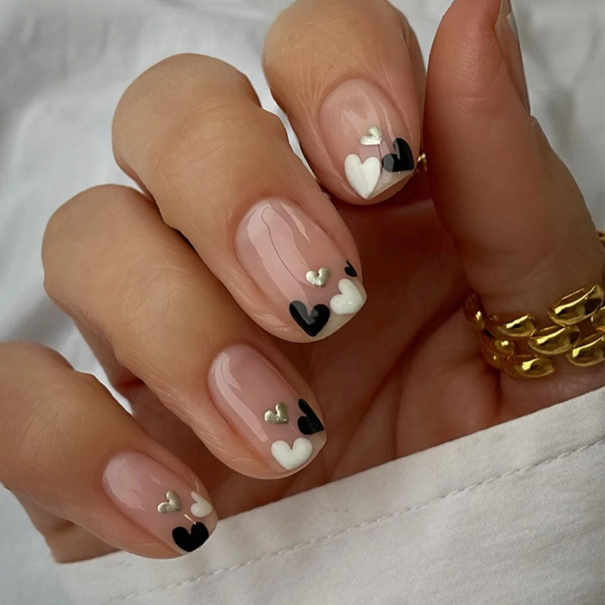 24 pieces of short square fake nails, featuring a halo dyed gradient heart and a colorful French design in European and American