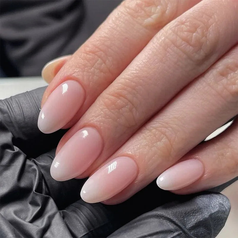 24Pcs Short Oval Head Blush Pink Press on Nails with Simple Designs Almond Nails Wearable Acrylic Full Cover Nail Tips with Glue